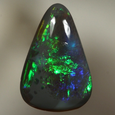 SOLID BLACK OPAL Bright fire. Green rolling flashes